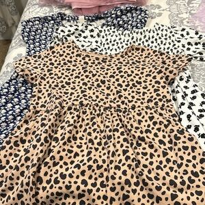 3 girls dresses. Size 5. Two are from Crewcuts and the leopard is from Target.